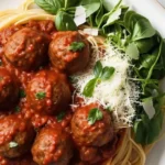 Best 5-star Spaghetti and Meatballs Recipe garnished with parsley, served with rich marinara sauce